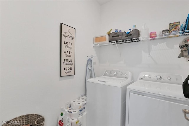 laundry area with washer and dryer