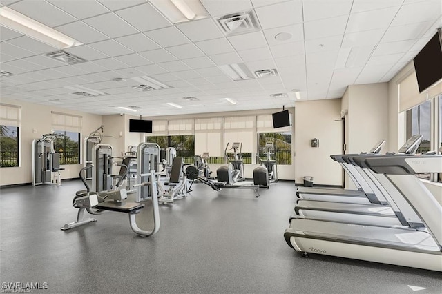 workout area featuring a drop ceiling