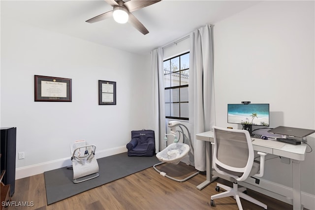 office area with hardwood / wood-style floors and ceiling fan