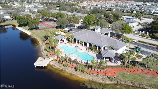 birds eye view of property featuring a water view