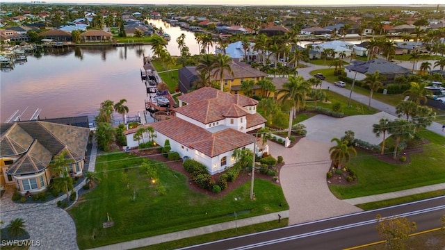 drone / aerial view featuring a water view