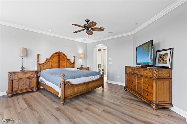 bedroom with ceiling fan, light wood-type flooring, and ornamental molding