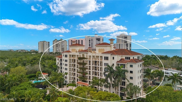 view of property with a water view