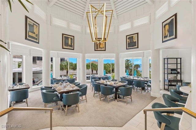 sunroom with a notable chandelier