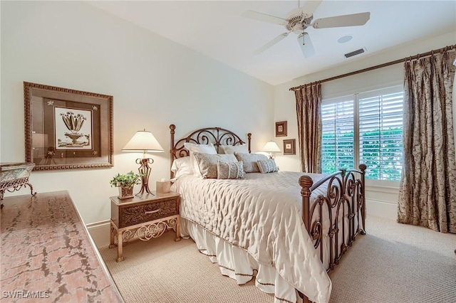 bedroom featuring ceiling fan, carpet, and lofted ceiling