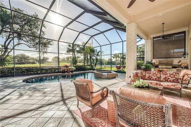 view of swimming pool featuring outdoor lounge area, glass enclosure, ceiling fan, an in ground hot tub, and a patio area