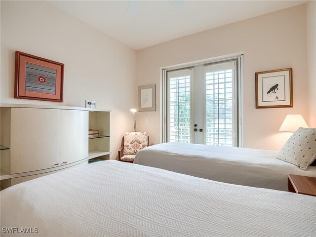 bedroom featuring access to exterior and french doors