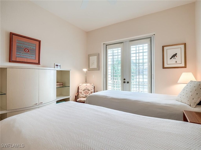 bedroom with access to outside and french doors