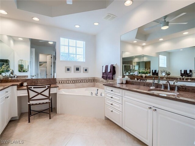 bathroom with separate shower and tub, vanity, ceiling fan, and tile patterned floors