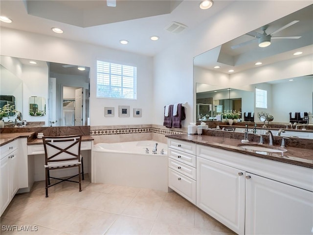 bathroom featuring ceiling fan, tile patterned floors, separate shower and tub, and vanity