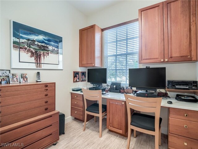 office area featuring built in desk