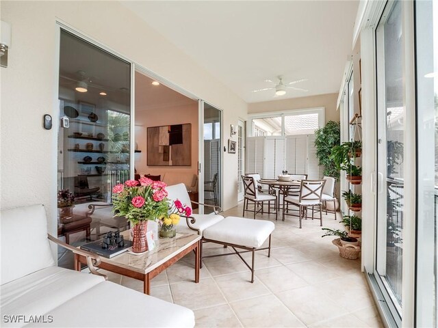 sunroom / solarium with ceiling fan