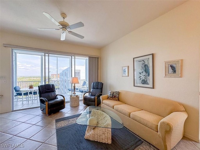 living room featuring tile patterned flooring and ceiling fan