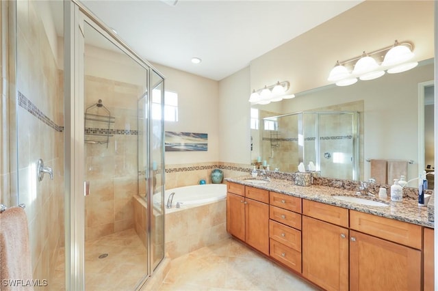 9067 Capistrano St N Unit 4502, Naples, FL 34113 - bathroom with tile patterned floors, vanity, and plus walk in shower