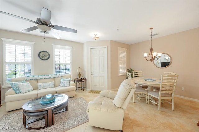 9067 Capistrano St N Unit 4502, Naples, FL 34113 - tiled living room featuring ceiling fan with notable chandelier
