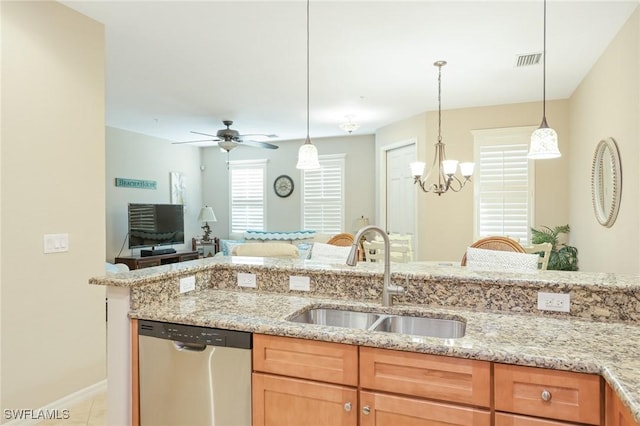 9067 Capistrano St N Unit 4502, Naples, FL 34113 - kitchen with stainless steel dishwasher, ceiling fan with notable chandelier, light stone countertops, and sink