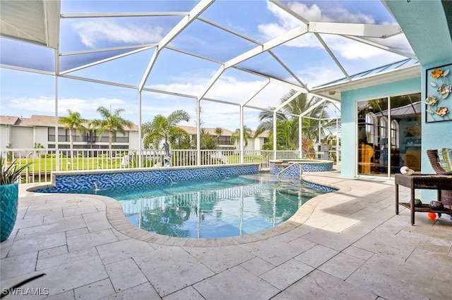 view of swimming pool featuring a patio, glass enclosure, and an in ground hot tub