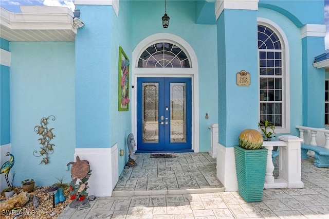 entrance to property featuring french doors