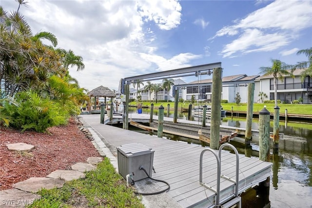 dock area featuring a water view