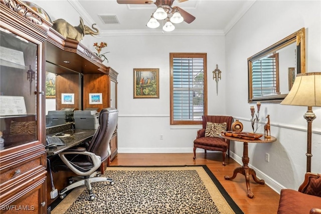 office featuring ornamental molding, ceiling fan, and light wood-type flooring