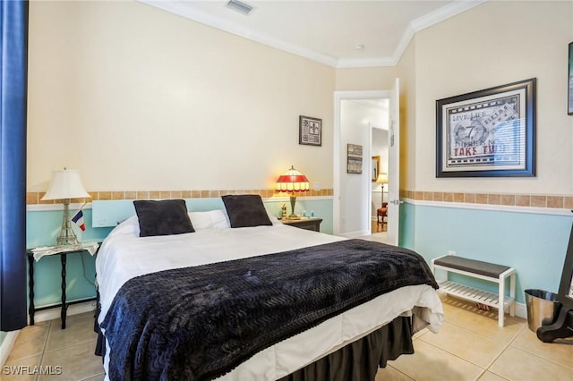 tiled bedroom with ornamental molding