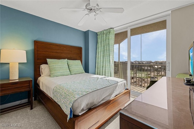 carpeted bedroom with access to exterior and ceiling fan