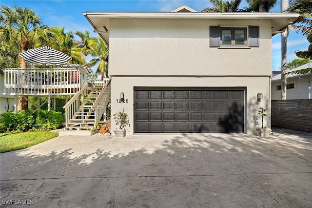 view of side of home with a garage