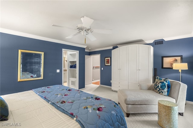 carpeted bedroom featuring a closet, ceiling fan, and ornamental molding