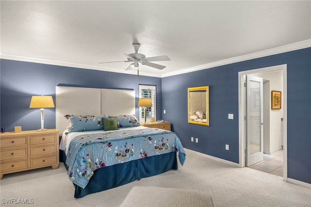 bedroom featuring light colored carpet, ceiling fan, and crown molding