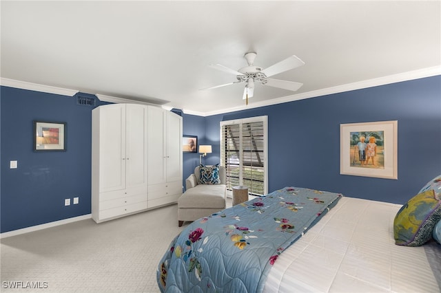 bedroom with carpet floors, a closet, ceiling fan, and ornamental molding