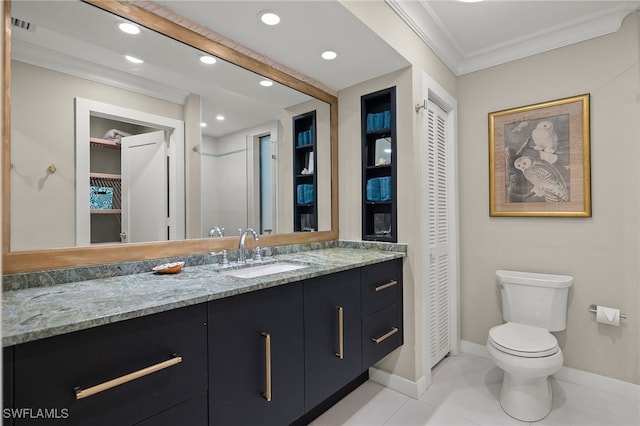 bathroom featuring vanity, a shower, crown molding, tile patterned flooring, and toilet