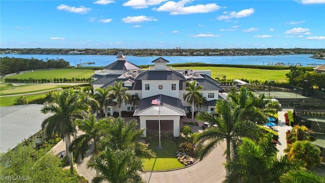 bird's eye view featuring a water view and golf course view