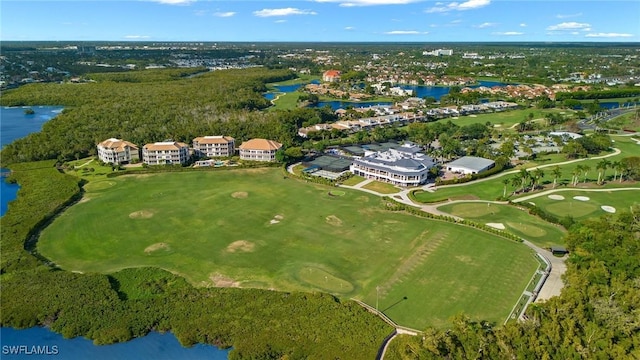 drone / aerial view featuring a water view and golf course view