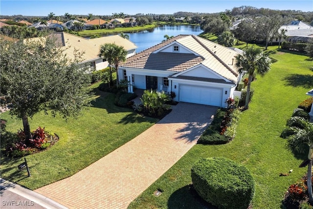 birds eye view of property featuring a water view