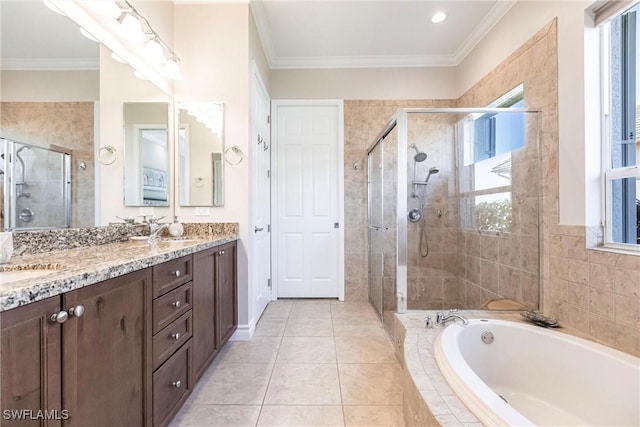 bathroom featuring tile patterned floors, vanity, plus walk in shower, and ornamental molding