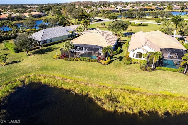 drone / aerial view with a water view