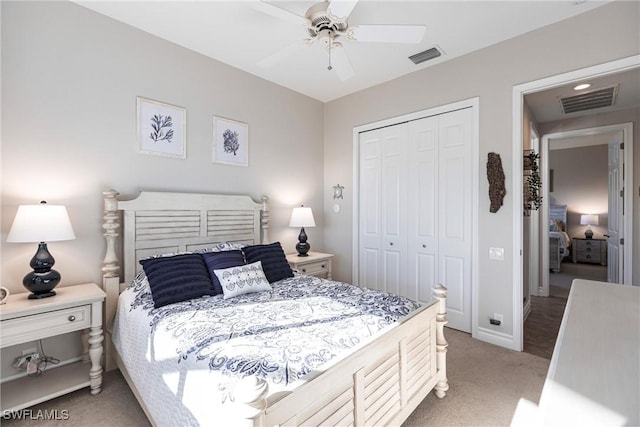 carpeted bedroom with a closet and ceiling fan