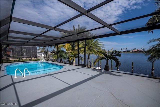 outdoor pool with a lanai, a water view, and a patio