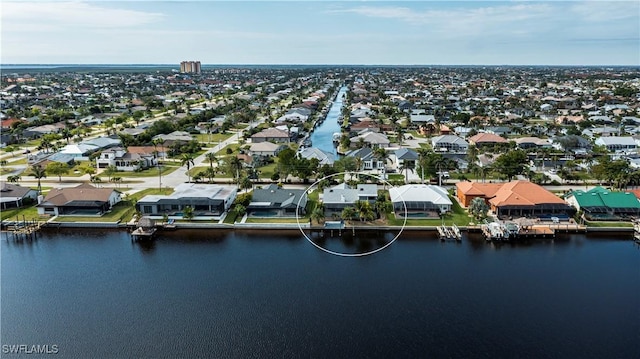 aerial view featuring a water view and a residential view