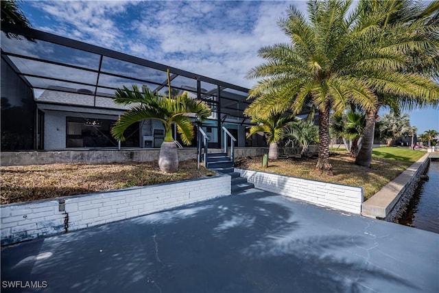 exterior space featuring a lanai