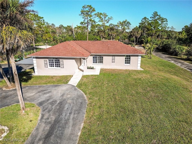 view of front of home with a front yard