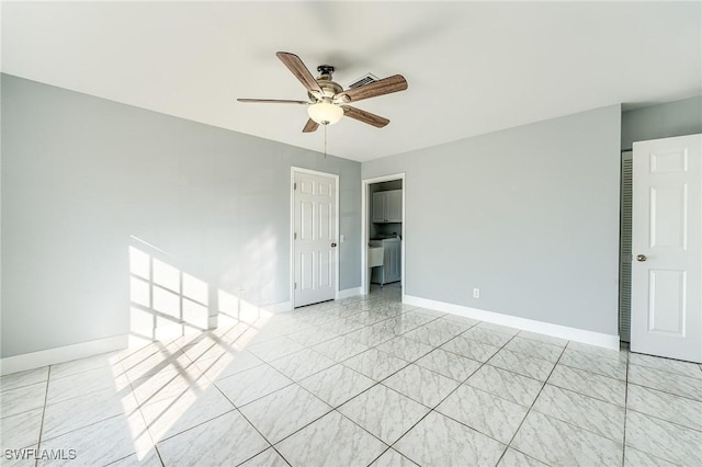 unfurnished room with ceiling fan