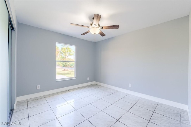 spare room featuring ceiling fan