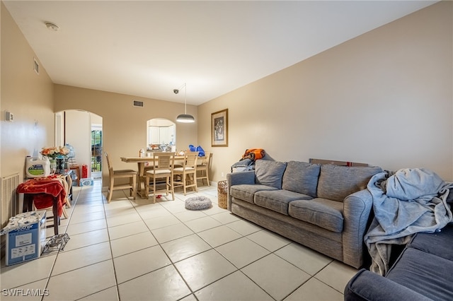 living room with light tile patterned floors