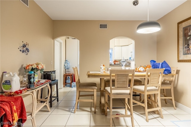 dining room featuring light tile patterned flooring