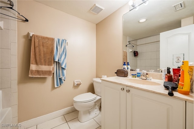 full bathroom with toilet, vanity, tile patterned flooring, and tiled shower / bath combo