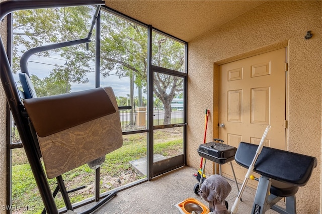 sunroom / solarium featuring plenty of natural light