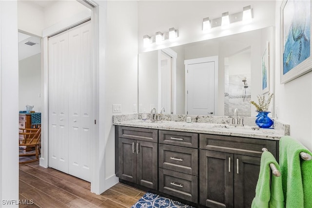 bathroom with vanity and an enclosed shower