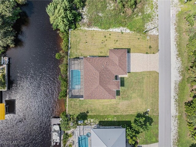 drone / aerial view featuring a water view