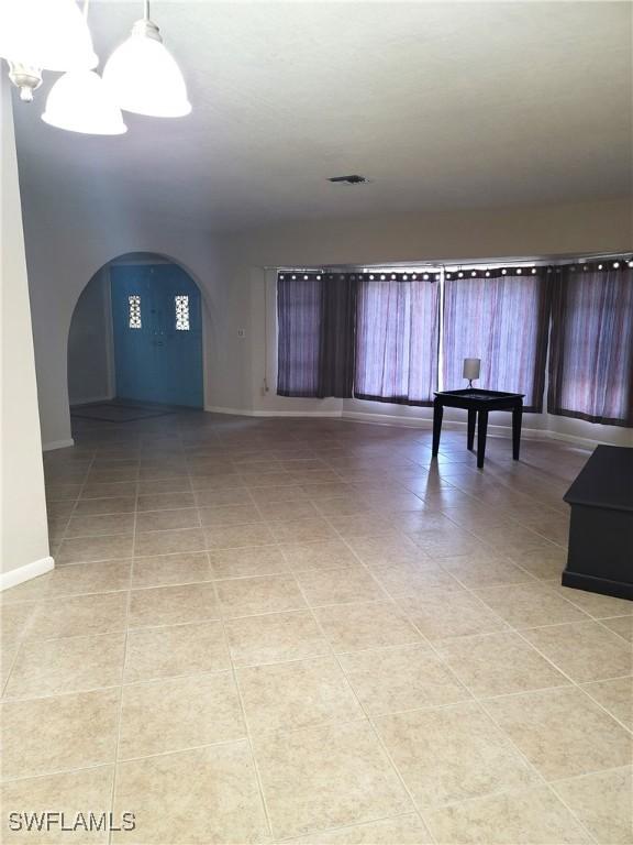 interior space with an inviting chandelier